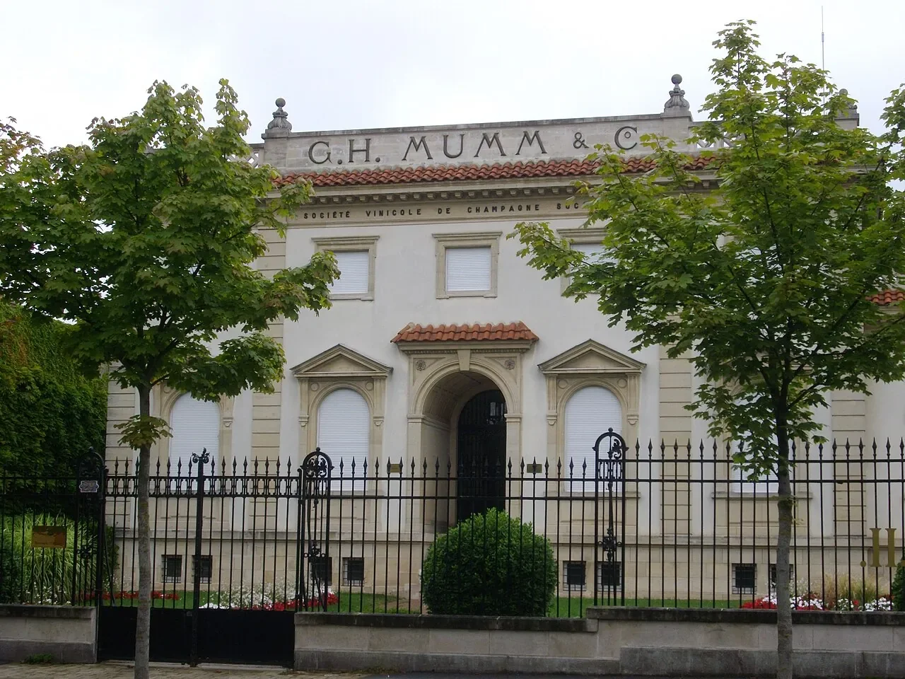 G.H. Mumm’s Reims building behind iron railings