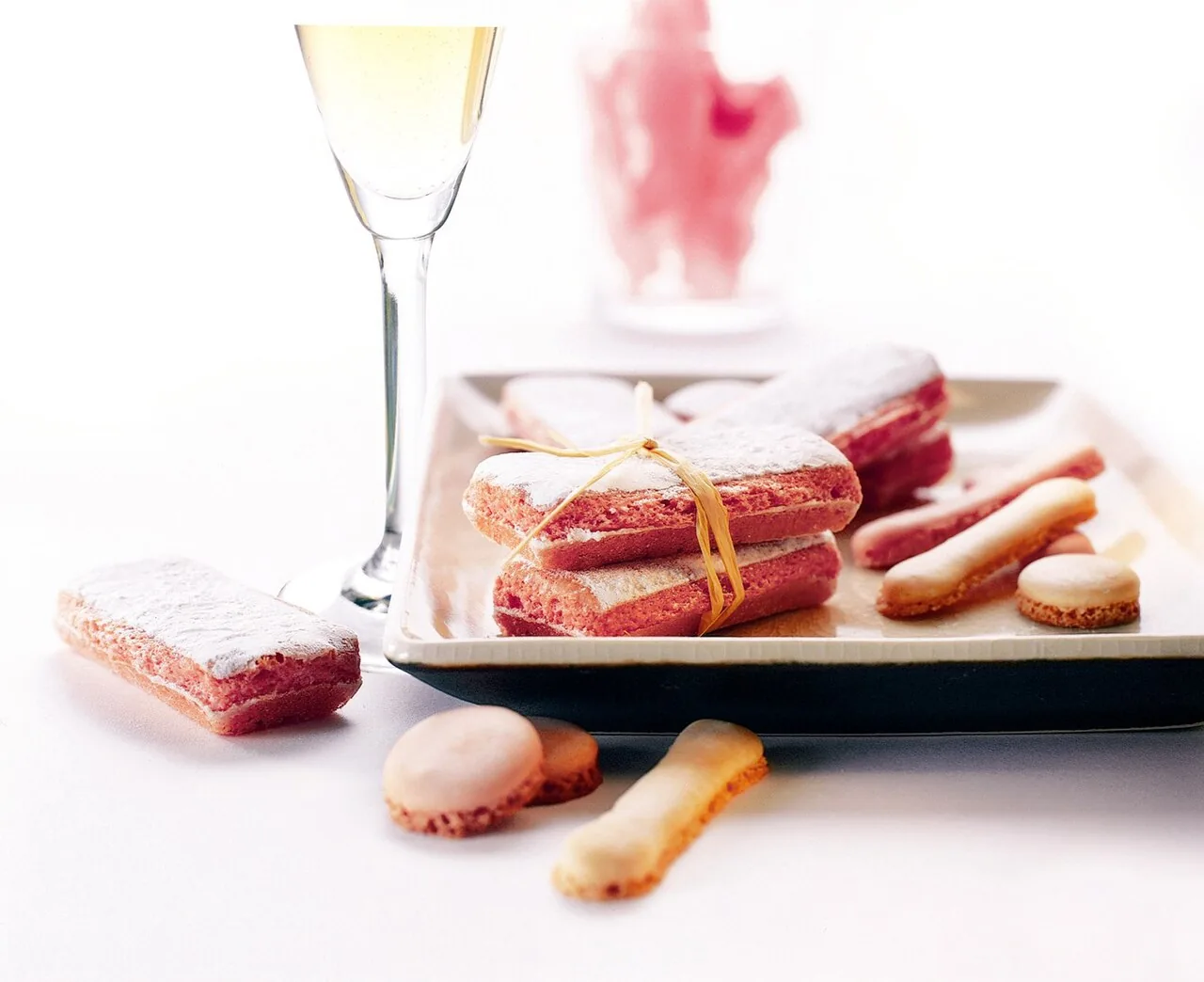 Pink biscuits of Reims with a flute of Champagne