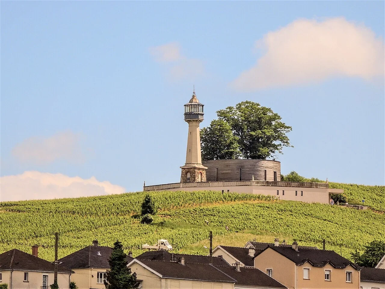 The Verzenay lighthouse overlooking vineyards and village rooftops