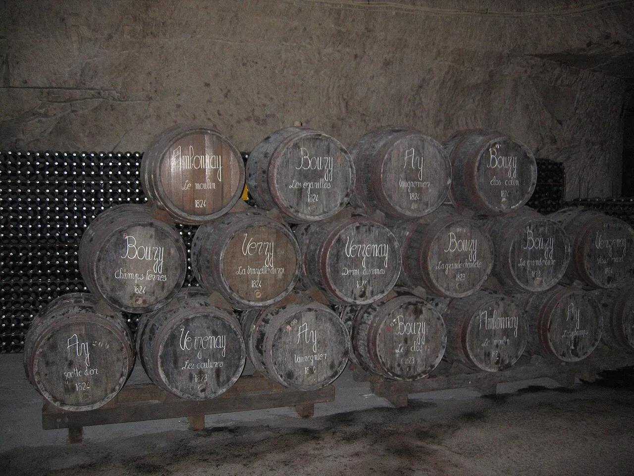 Tomas er — CC BY-SA 4.0 Wine barrels in the Veuve Clicquot cellars in Reims